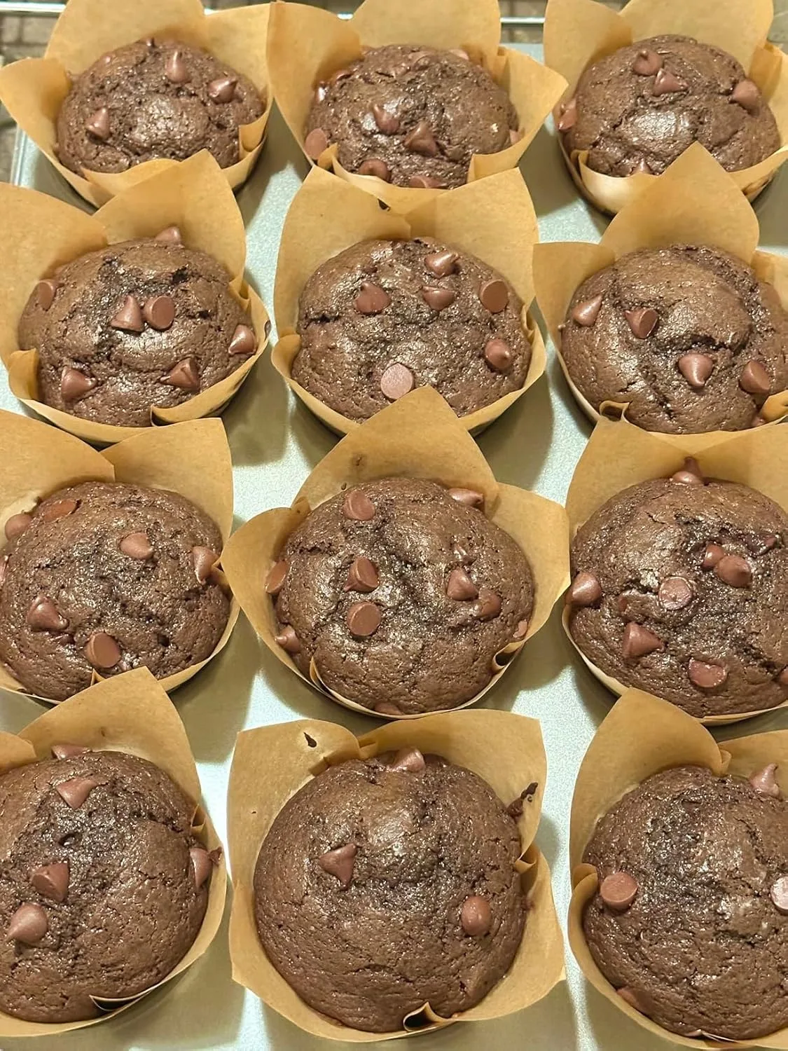 Customer photo of chocolate haystack cookies stacked on a plate, showing the no-bake texture and chocolate coating