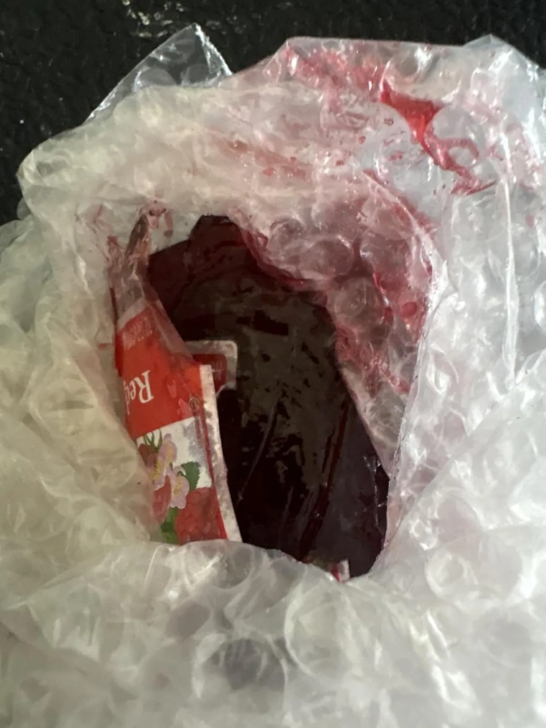 Customer photo of homemade raspberry jam cookie bars with golden edges and jam filling