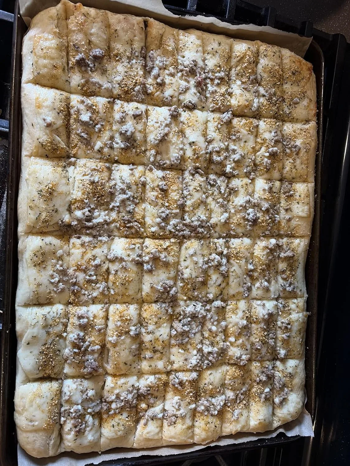 Customer photo of homemade cream-filled chocolate cookies cooling on a wire rack