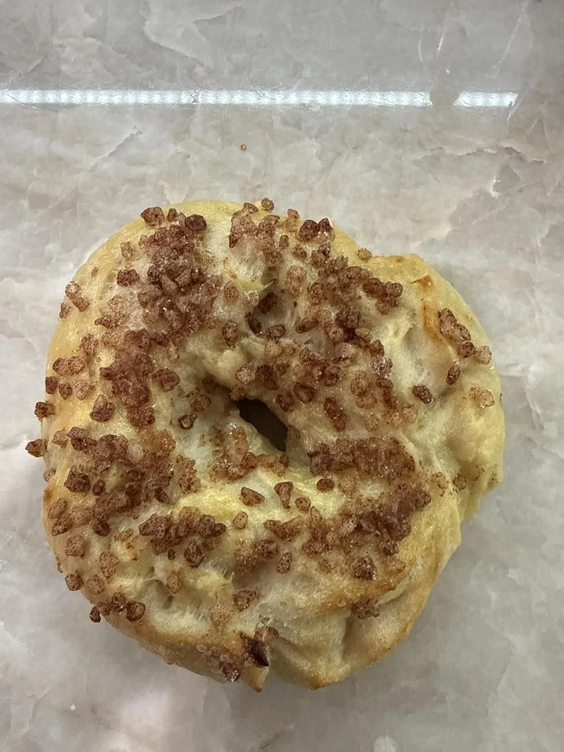 Customer photo of cinnamon roll cookies showing the swirled cinnamon pattern and frosting topping