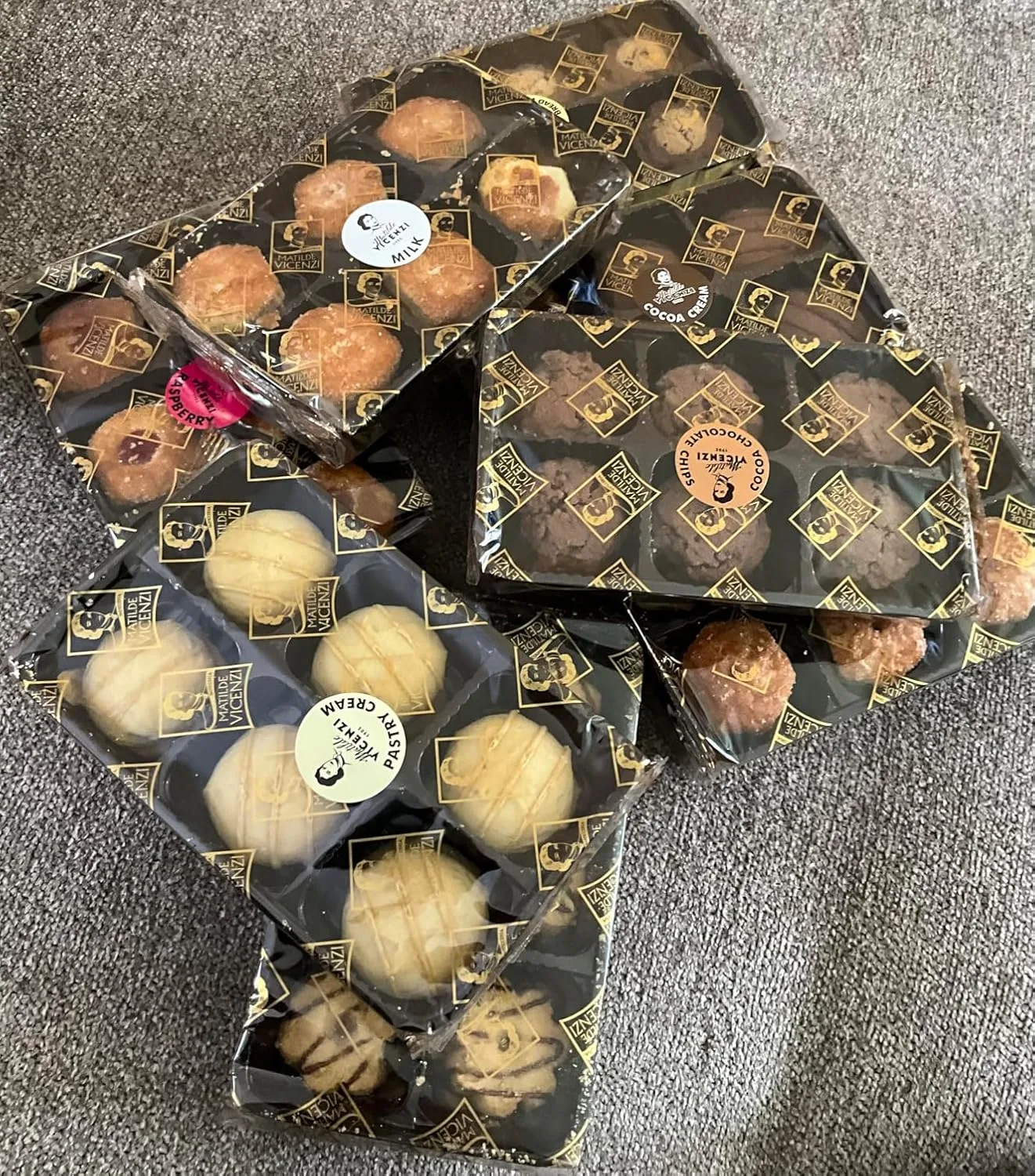 Customer photo of opened cookie box displaying assorted homemade-style cookies inside packaging