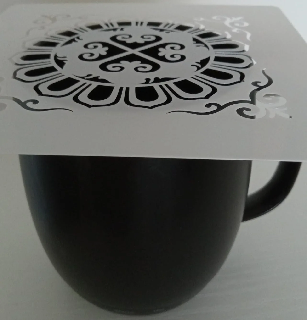 Customer photo of decorated cookies with stenciled designs showing crisp, detailed patterns